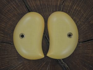 American Derringer  aged ivory linen micarta  grips