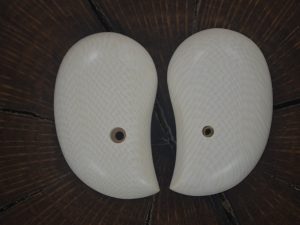 Imitation Ivory Bond arms grips