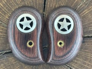 Bond arms laminated rose wood with silver Texas stars inlaid